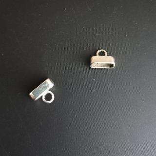 Kaplík vlepovací plochý 12x6 mm, otvor cca. 11x4mm, barva platina / balení 10 ks