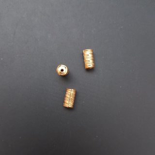 Korálek kov váleček 11x6 mm tvarovaný, barva zlatá / balení 100 ks 