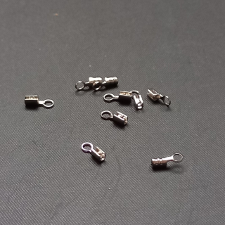 Koncovka na šňůrky, kůže plochá 7x2mm / balení 100 ks 